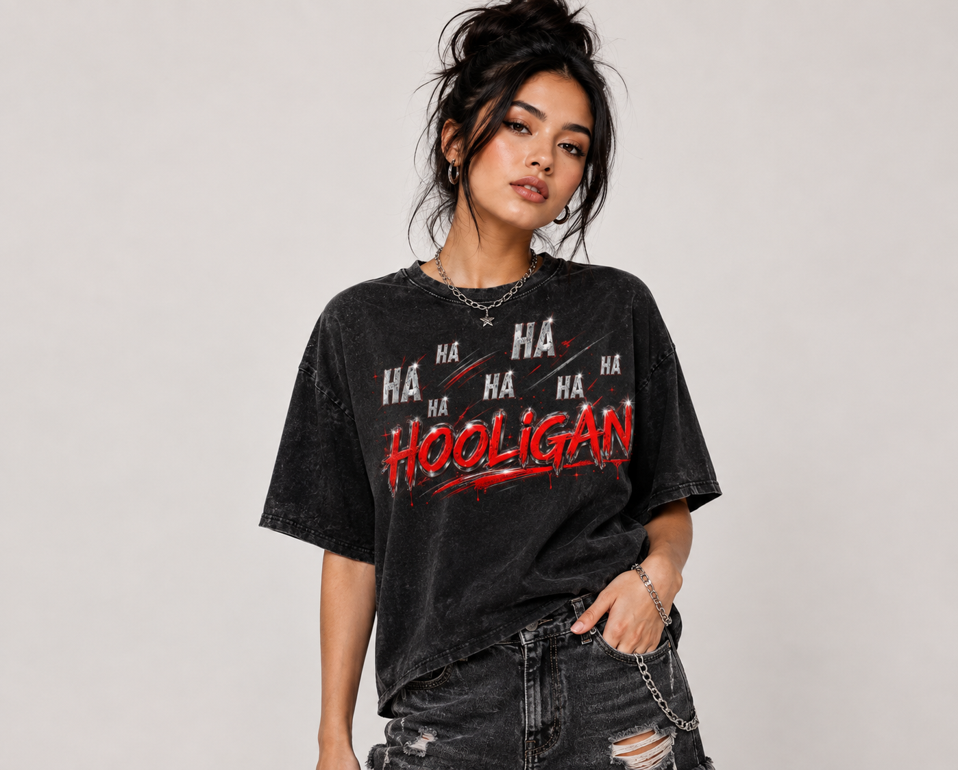 Model wearing Hooligan black snow-washed oversized graphic tee