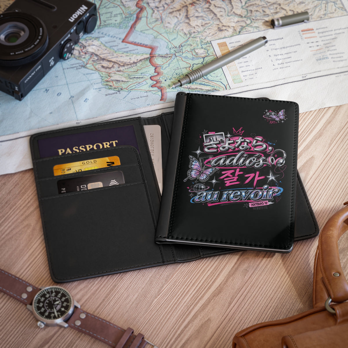 Global Goodbye passport cover styled with passport and travel accessories
