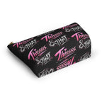 Angled view of black Thissss & THAT zipper makeup pouch