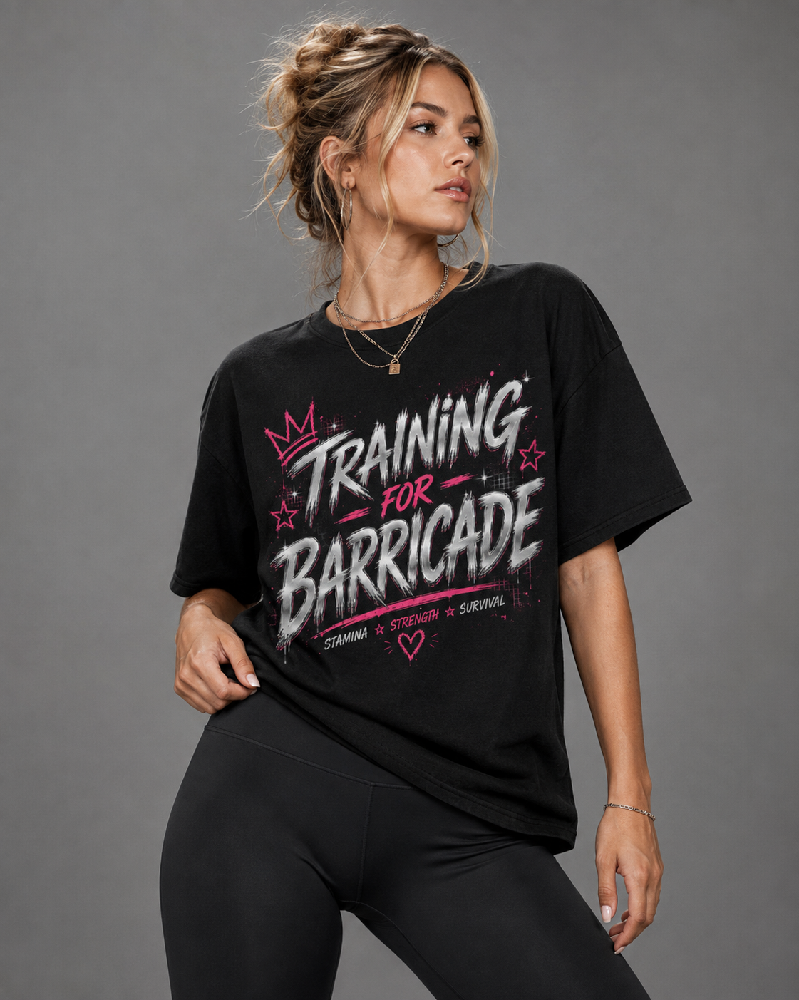 Woman wearing Training for Barricade oversized black graphic tee with pink and chrome grunge design