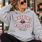Woman wearing heather gray NXTBIAS Official K-Pop Club Member hoodie