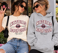 Two women wearing NXTBIAS K-Pop Club member T-shirt and hoodie