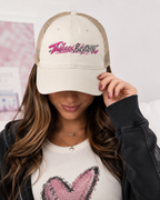 Model wearing cream Thissss & THAT washed trucker hat
