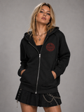 Woman wearing black Buenos Aires Concert Zip Hoodie with NXTBIAS front graphic